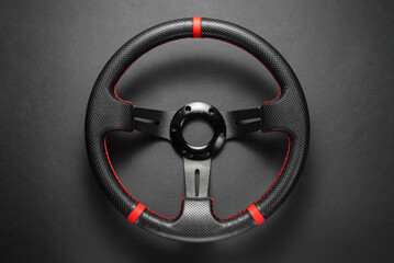Sport car steering wheel flat lay background.