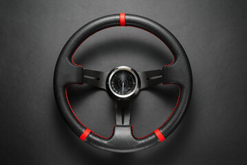 Sport car steering wheel top view background.