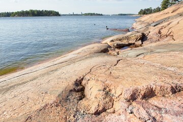 View of rocky seashore on the island of Kaparen, Espoo, Finland.