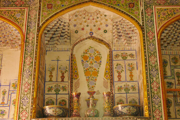 Fototapeta na wymiar floral motifs on the wall of the summer palace Sitorai Mohi Hossa in Bukhara.