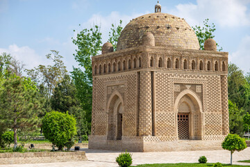 The Samanid mausoleum is located in the historical urban nucleus of the city of Bukhara, in a park laid out on the site of an ancient cemetery. - obrazy, fototapety, plakaty