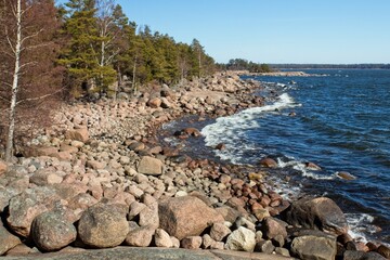 View of rocky seashore at Varlaxudden recreation area, Emäsalo, Finland.