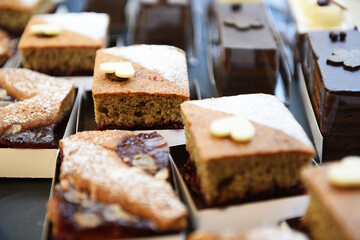 Pieces of cakes in boxes