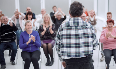 Group of retired senior people in the meeting