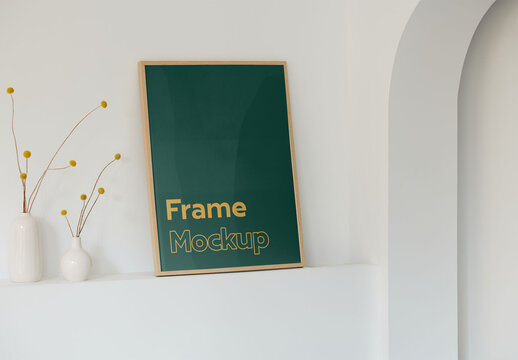 Big Wood Frame Mockup on a White Shelf With Natural Light
