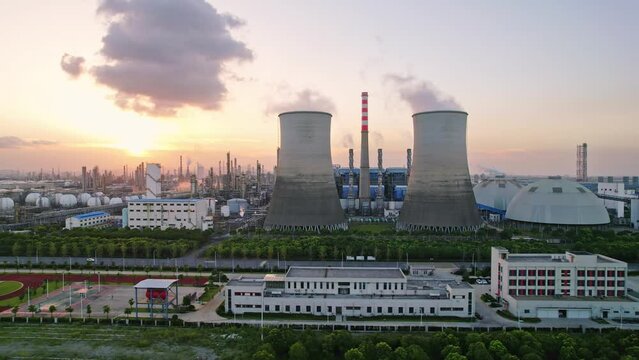 aerial view of power plant at sunset
