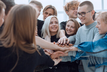 large group of young people showing their unity