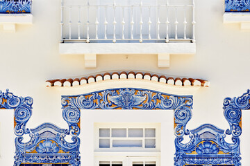 panel of azulejos tiles on the facade of old railways station in Aveiro, Portugal..