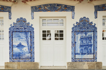 panel of azulejos tiles on the facade of old railways station in Aveiro, Portugal..