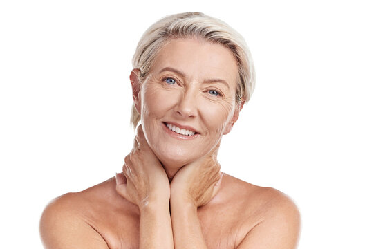 Portrait of a happy mature caucasian woman posing topless against pink background copyspace . Happy senior woman with glowing skin. Good skincare and a healthy routine is self care for your skin