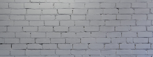 Old rough white painted brick wall large texture. Whitewashed brickwork masonry backdrop. Light grunge abstract background 