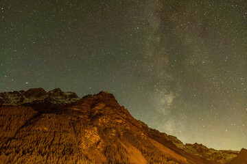 Fototapeta na wymiar Milky way starlight over the Alps and the universe near Lyon in the alps