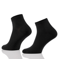 Black cotton short sock on invisible foots isolated on white background.