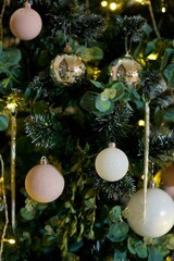 Elegant decorated with balls and figures Christmas tree