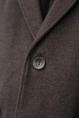 Close-up photo of a buttoned button