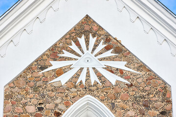 Gozha, Hoza - November 2021: All Seeing Eye symbol as detail of Catholic church of St. Peter and...