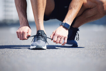 Hands, lace tie or running shoes in city workout, training or marathon exercise for health,...