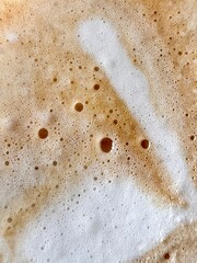 Close up coffee milk froth isolated background