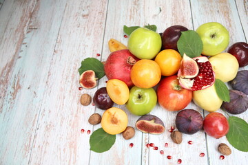 Fresh fruits on wooden background