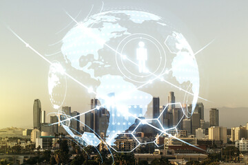 Virtual social network media hologram and world map on Los Angeles cityscape background. Double...