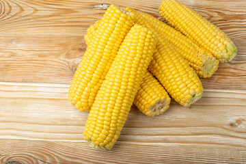 Sweet Corn Ears on Wooden Desk
