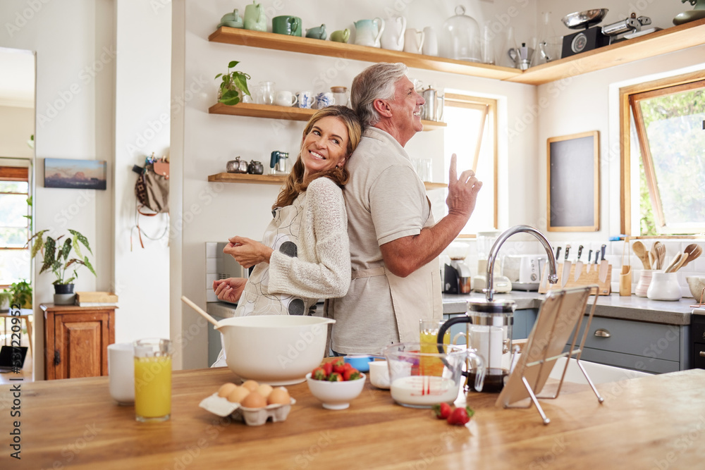 Canvas Prints Senior couple dance, cook breakfast in the kitchen and love making food together in retirement time. Elderly people smile, have fun cooking or baking pancakes and healthy meals while dancing at home