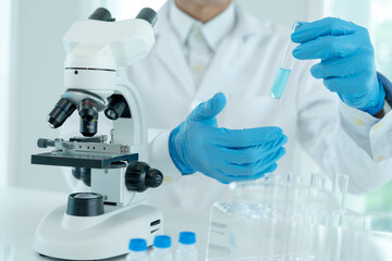 Scientist analyze biochemical samples in advanced scientific laboratory. Medical are mixing...