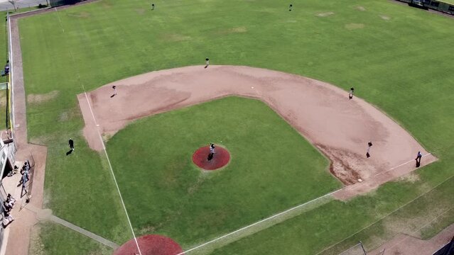 baseball players playing a game on the field.