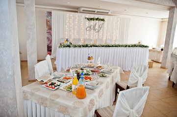 Wedding table set up in restaurant.