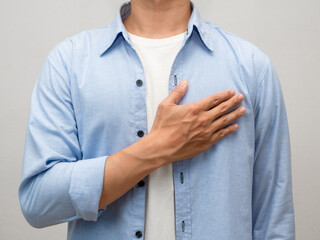Close-up man touch his chest for lover portrait studio shot