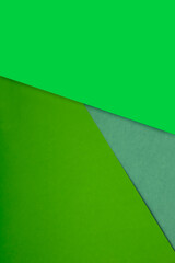 Dark and light, Plain and Textured Shades of green papers background lines intersecting to form a triangle shape