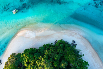 Top view of white sand beach tropical with seashore as the island in a coral reef ,blue and...