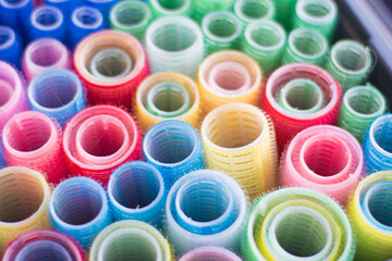Detail of colored curlers in a hairdresser. Hairdresser tools.