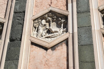 Fototapeta na wymiar Decorative bas-reliefs on the outside of Florence Cathedral, (formally the Cathedral of Santa Maria del Fiore)