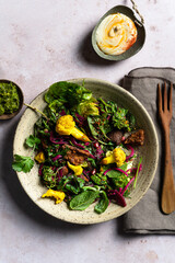 Top down view of a Middle Eastern fattoush salad with cauliflower