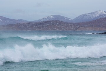 Beautiful shot of waves washing up the shore in Harris, Outer Hebrides