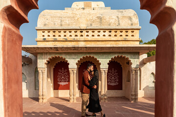A young Indian couple shooting their pre wedding at a heritage fort in Delhi India. Romantic couple...