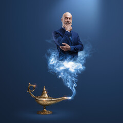 Business executive coming out from a magic lamp