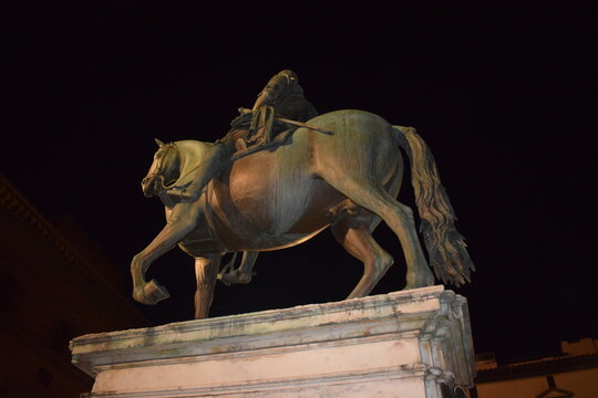 The Equestrian Monument of Ferdinando I, a bronze equestrian statue by Giambologna, at night