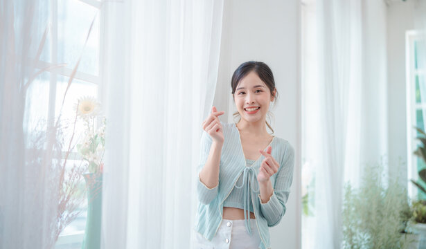 portrait of beautiful young asian woman, Closeup face of a pretty asian model looking at camera.