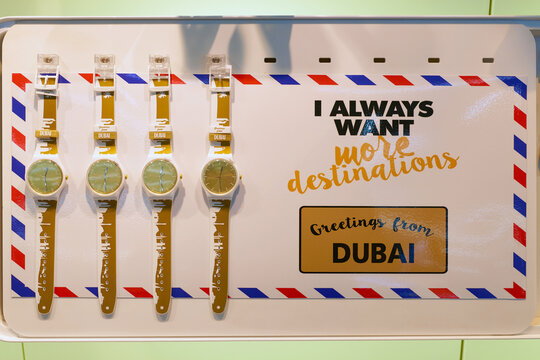 DUBAI, UAE - CIRCA NOVEMBER, 2016: Swatch watches in a store at Dubai International Airport. Swatch is a Swiss watchmaker founded in 1983 by Nicolas Hayek