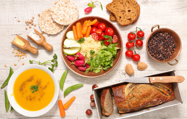assorted of vegan dishes ( buddha bowl,  soup,  bread,  vegan bread cake)