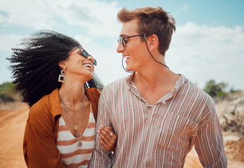Travel, diversity and couple love a safari date to enjoy nature, honeymoon vacation and summer holidays in Dubai. Desert, smile and happy woman with a young, fun and relaxed partner with freedom © Kay Abrahams/peopleimages.com
