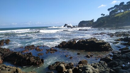 waves breaking on rocks