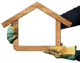 Manual worker with protective work gloves holding a blank wooden frame in the shape of a house, isolated on white or transparent background with copy space. Photography, png.