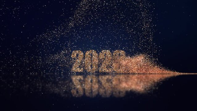 2023 new year numbers in gold particles.
