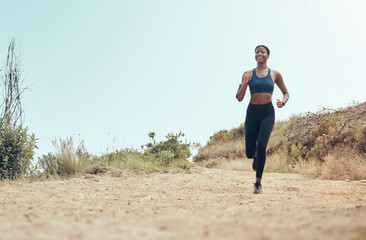 Fitness, running and black woman on nature trail for marathon cardio exercise in Hollywood USA....
