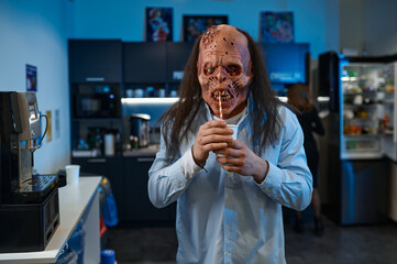 Creepy zombie office drinking coffee portrait