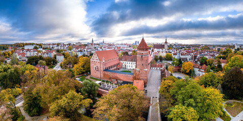 Fototapeta na wymiar Olsztyn castle in autumn aerial shot at sunrise.