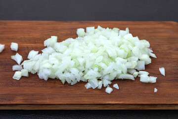 Chopped onion on a cutting board close-up